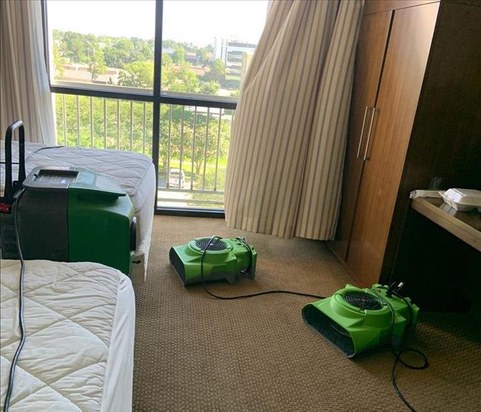 Air movers in a hotel room.