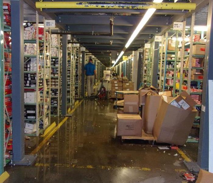 Standing water in commercial ware house.